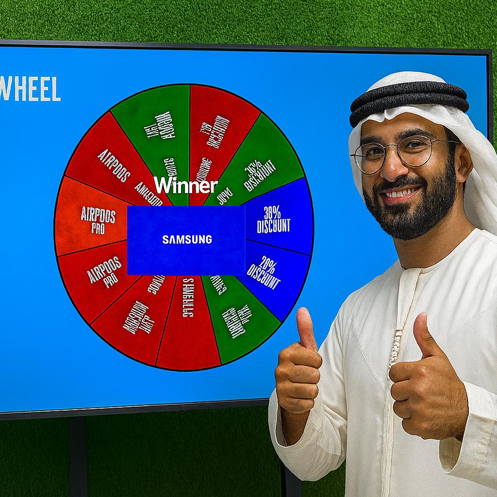 Arab male playing Spin the Wheel game at an exhibition event in Dubai, wearing traditional kandura, fully branded setup with digital screen and prize display, engaging crowd.